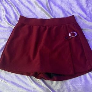 red belted shorts with skirt flap front size medium